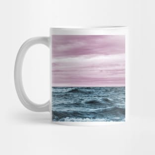 Pink skies over the ocean Mug